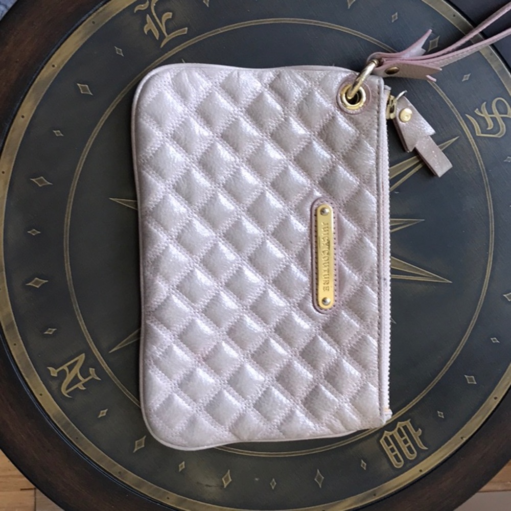 Juicy Couture wristlet/small purse. Worn once